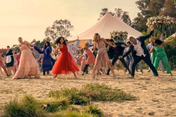 the perfect couple l to r dakota fanning as abby winbury, isabelle adjani as isabel nallet, eve hewson as amelia sacks, mia isaac as chloe, michael mcgrady as bruce sacks, meghann fahy as merritt monaco, ishaan khattar as shooter dival, liev schreiber as tag winbury in episode 105 of the perfect couple cr hilary bronwyn gaylenetflix © 2024