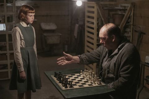 the queen’s gambit l to r isla johnston as beth orphanage and bill camp as mr shaibel in episode 101 of the queen’s gambit cr phil braynetflix © 2020