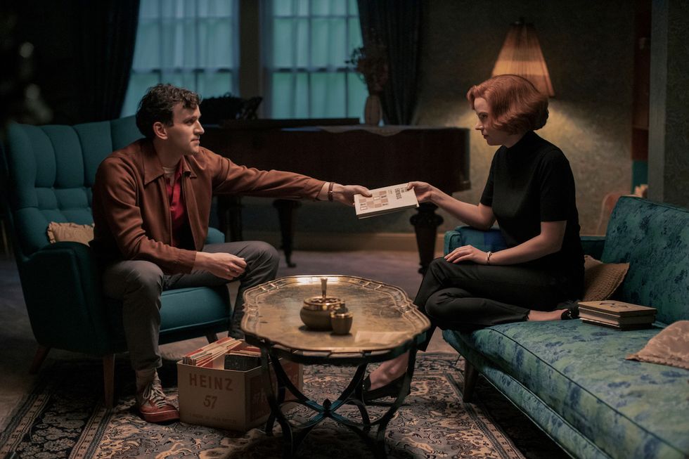 the queen’s gambit l to r harry melling as harry beltik and anya taylor joy as beth harmon in episode 104 of the queen’s gambit cr phil braynetflix © 2020