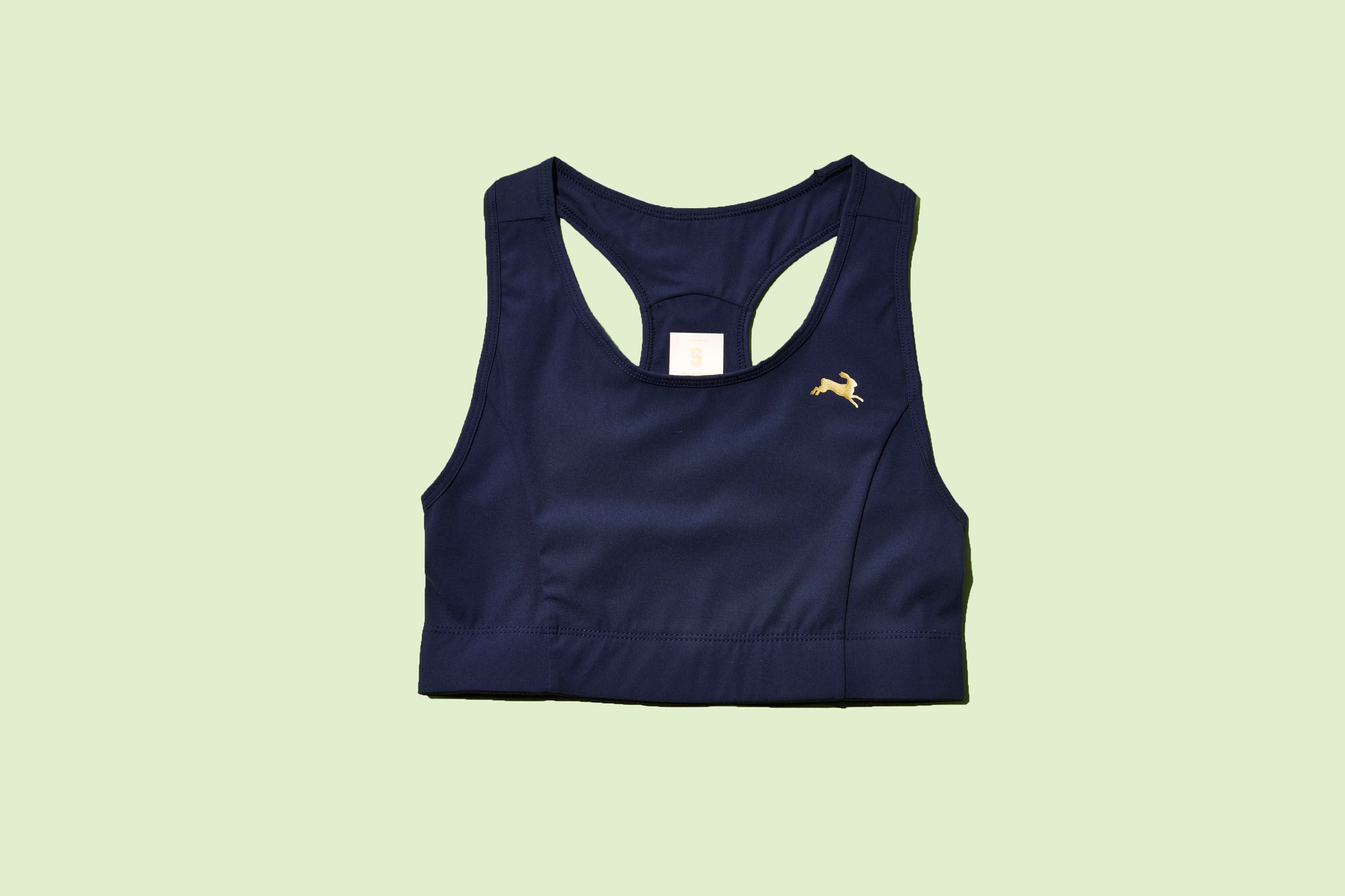 Clothing, Sleeveless shirt, Outerwear, Sportswear, Yellow, Vest, Font, Sports uniform, Active tank, One-piece garment, 