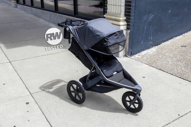 a stroller on a sidewalk