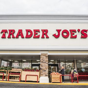trader joes grocery store entrance with sign