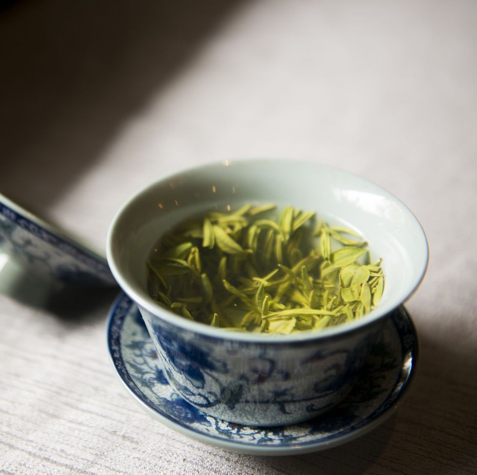 traditional chinese tea cup with green tea