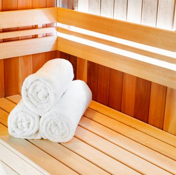 traditional classic wooden sauna for relaxation with bucket of water and towels, costco dynamic bergamo 4 person indoor low emf far infrared sauna