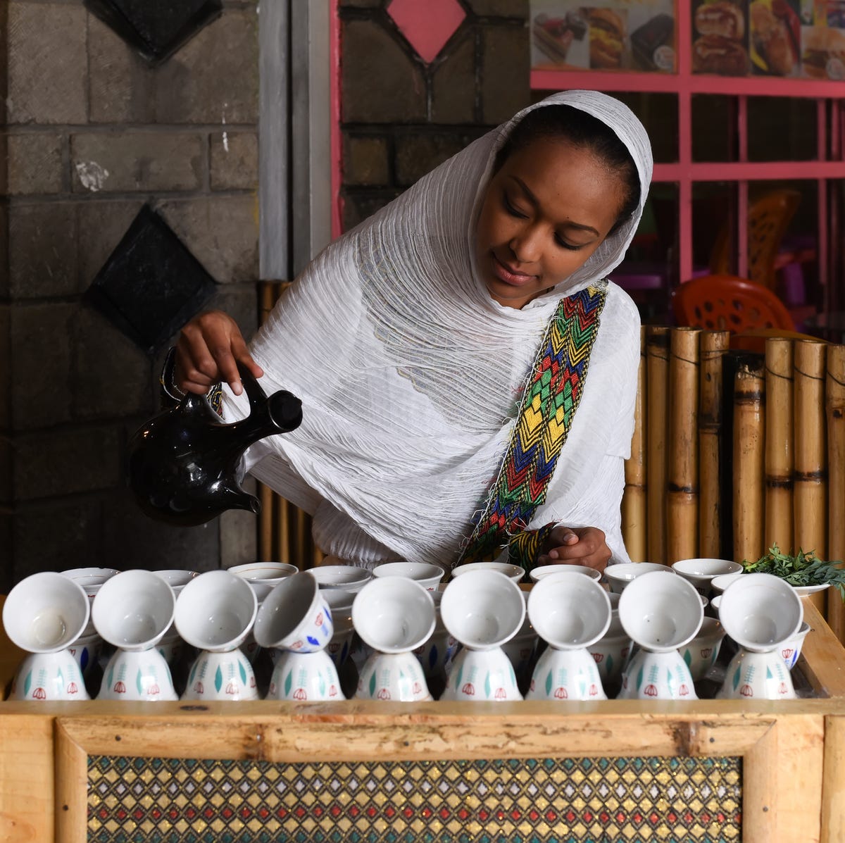 https://hips.hearstapps.com/hmg-prod/images/traditional-coffee-ceremony-royalty-free-image-1722265800.jpg?crop=0.806xw%3A1.00xh%3B0.0978xw%2C0&resize=1200%3A%2A