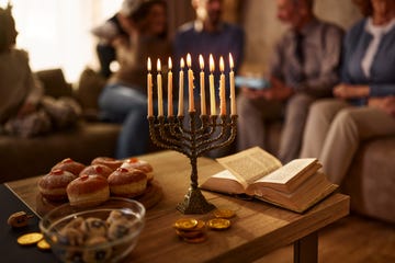 traditional food and menorah for hanukkah