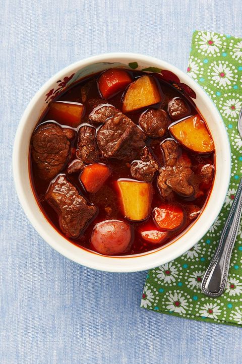 beef stew with carrots and potatoes in bowl