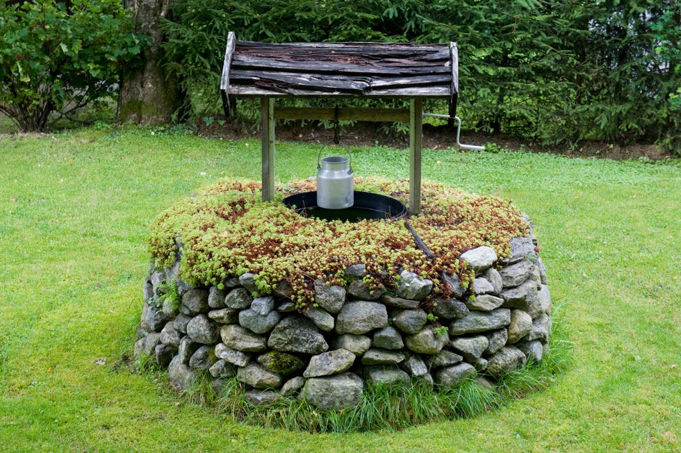 traditional well, olden village, nordfjord, norway