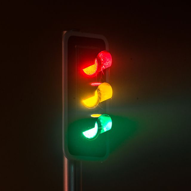 traffic light on foggy night