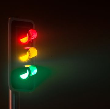 traffic light on foggy night