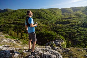 trail runner at the top of the mountain