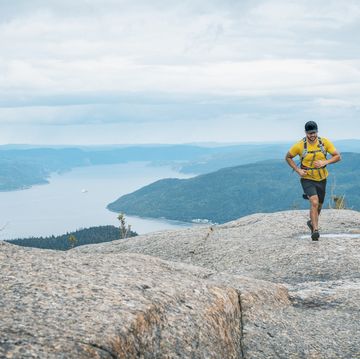 trail runner with saint lawrence in background