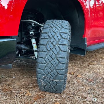 goodyear wrangler duratrac tire on a red chevy silverado