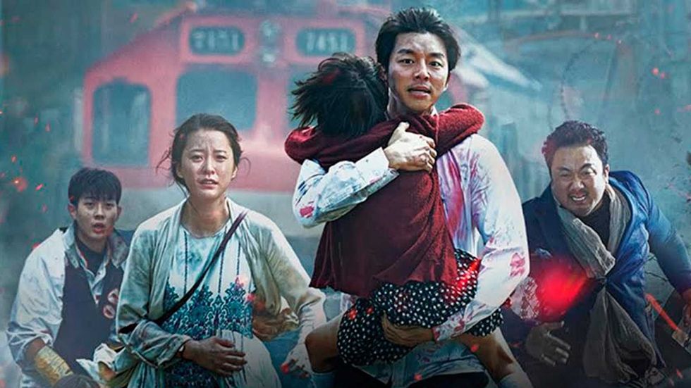 una familia coreana escapa de unos zombies en la película train to busan