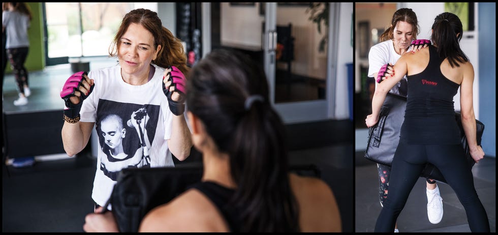 monica corcoran harel spars with fellow student belinda chen while training in the self defense practice of krav maga