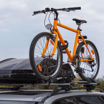 transportation of bicycles on the roof of the car concept a car trip with a bike