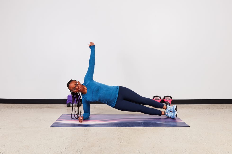 monique lebrun performing a side plank as part of the transverse abdominis set of exercises