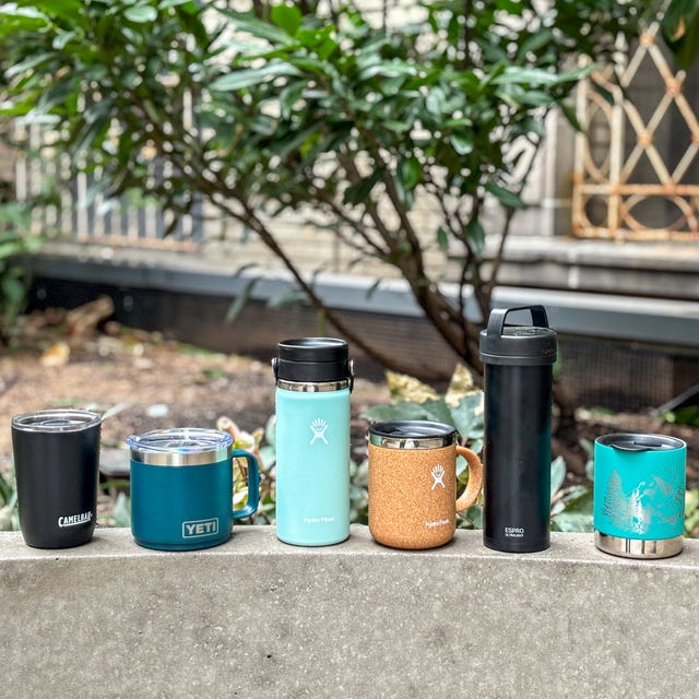 a group of coffee cups and cans