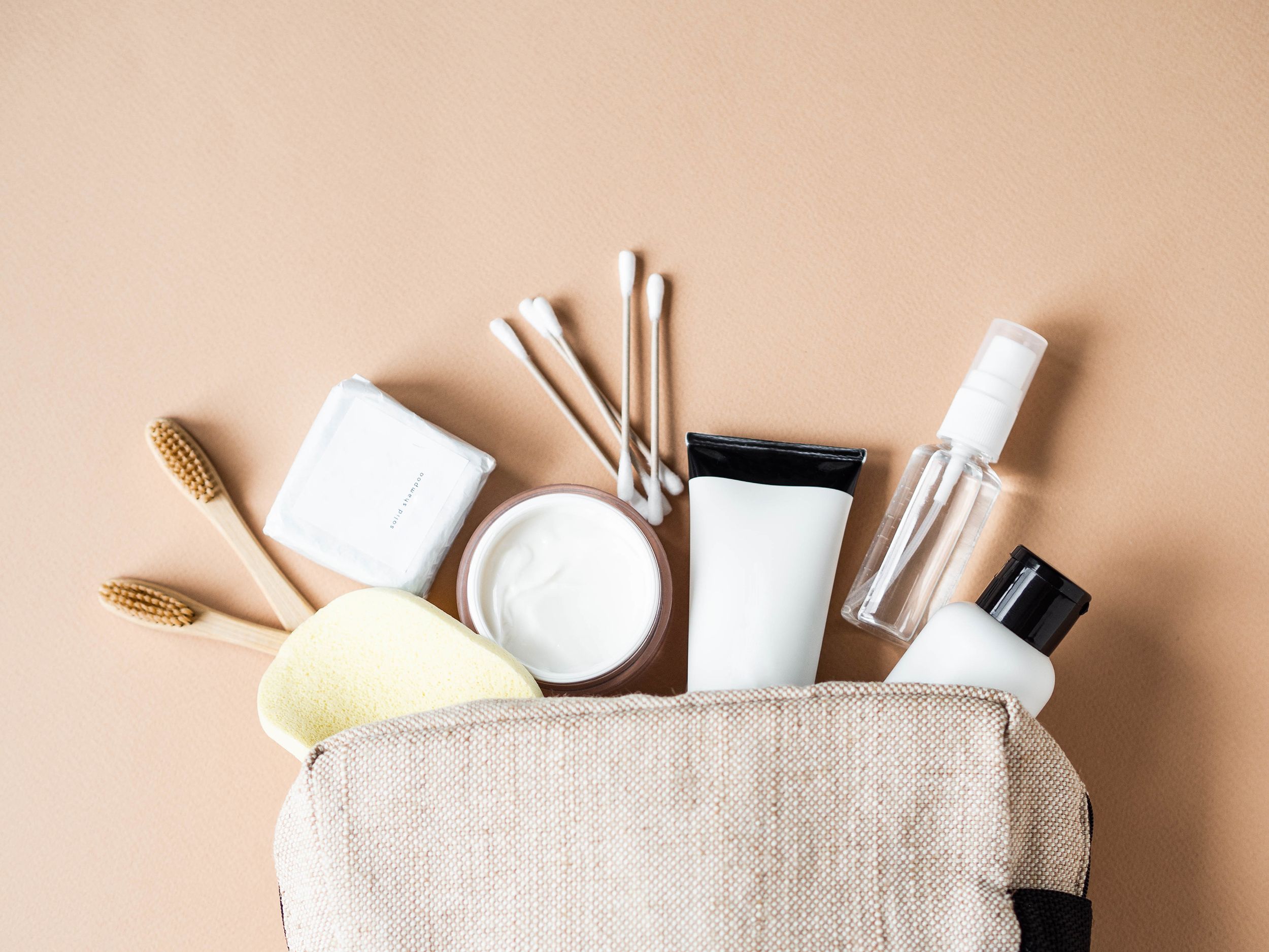 Packing List: Toiletry & Beauty Essentials for Women - The Emerald