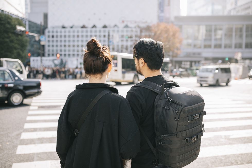 travelers exploring tokyo