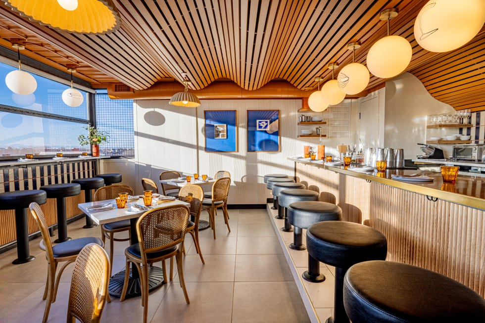 a room with tables and chairs