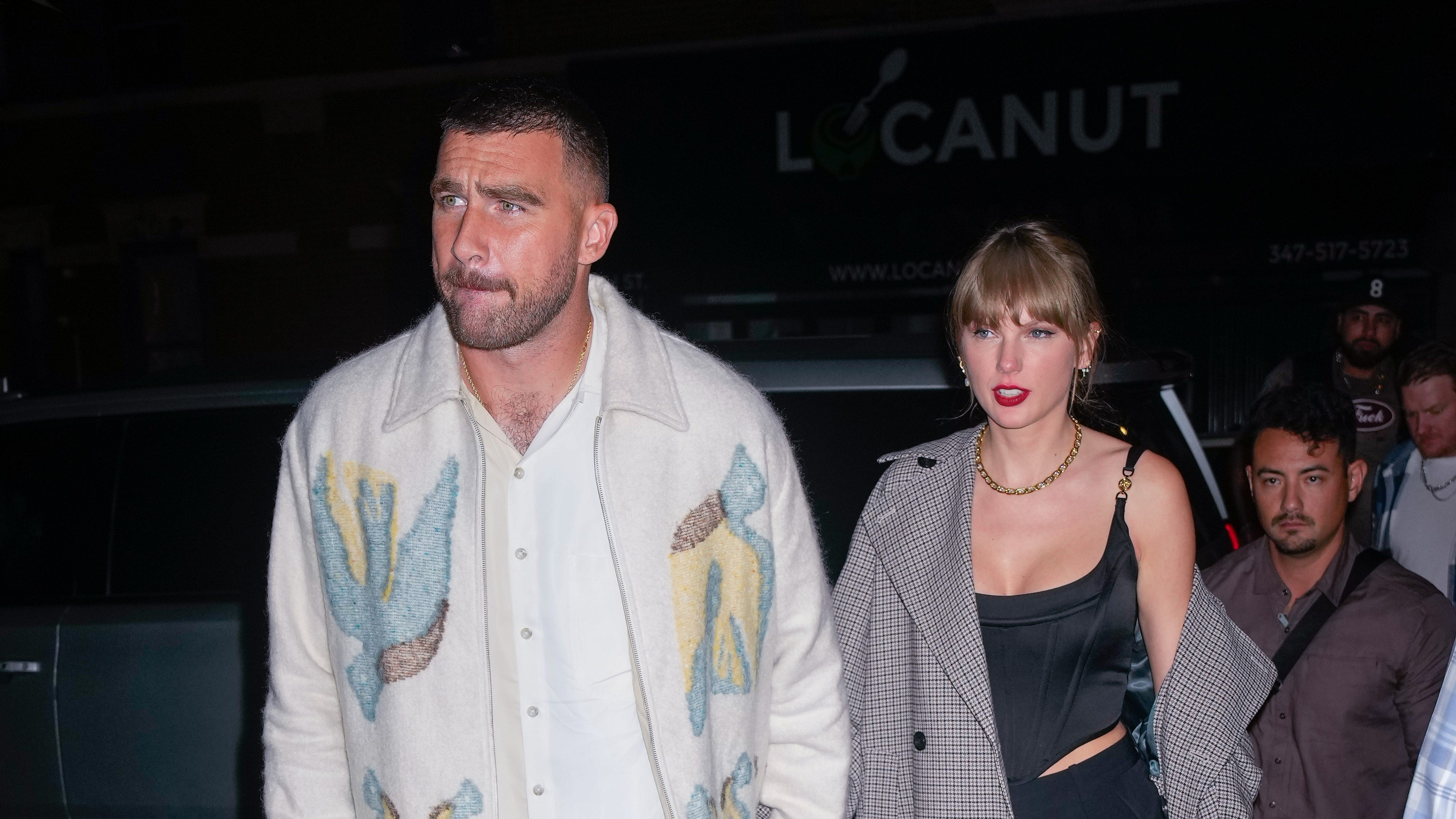 Travis Kelce wears '1989' inspired suit as he leaves Chiefs game with  Taylor Swift