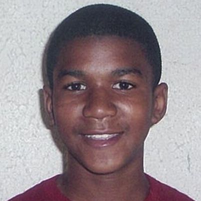 FILE - In this undated file family photo, Trayvon Martin poses for a family photo. College students around Florida rallied Monday, March 19, 2012, to demand the arrest of a white neighborhood watch captain who shot unarmed teen Martin last month, though authorities may be hamstrung by a state law that allows people to defend themselves with deadly force.