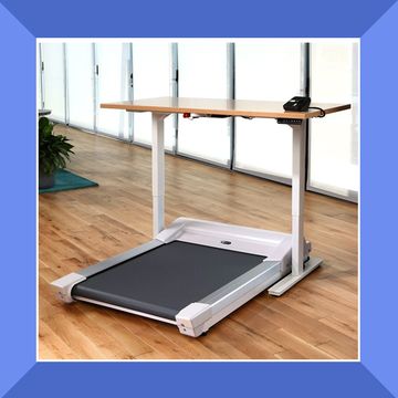 a person walking on an under desk treadmill, and an under desk treadmill in a room