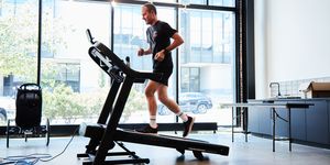 a person running an incline on a treadmill
