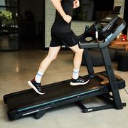 jeff dengate running Wolow on a treadmill that has an incline