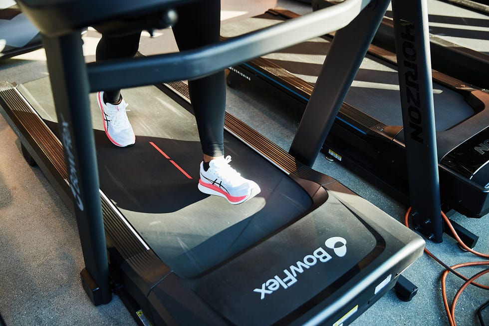 person running on treadmill