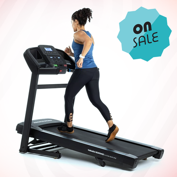 a person colour-block running on a treadmill, on sale