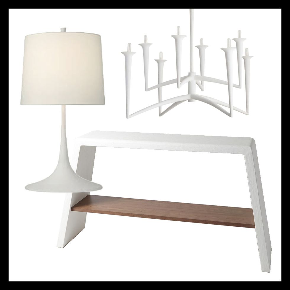 table lamp by barbara barry for visual comfort, console by form design for global views and chandelier by arteriors