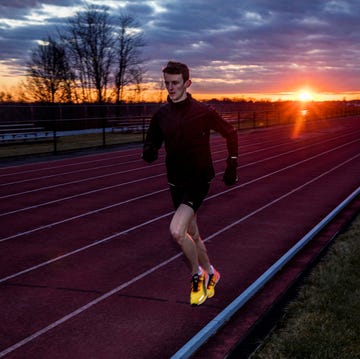 a person running on a track a person running on a track