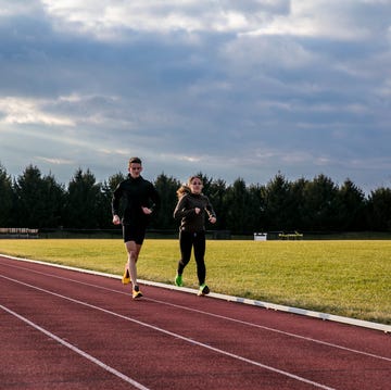 Runners running on a track runners running on a track
