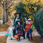 trick or treat mother with children going to trick or treat on halloween holiday