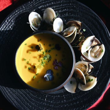 a bowl of soup with a spoon