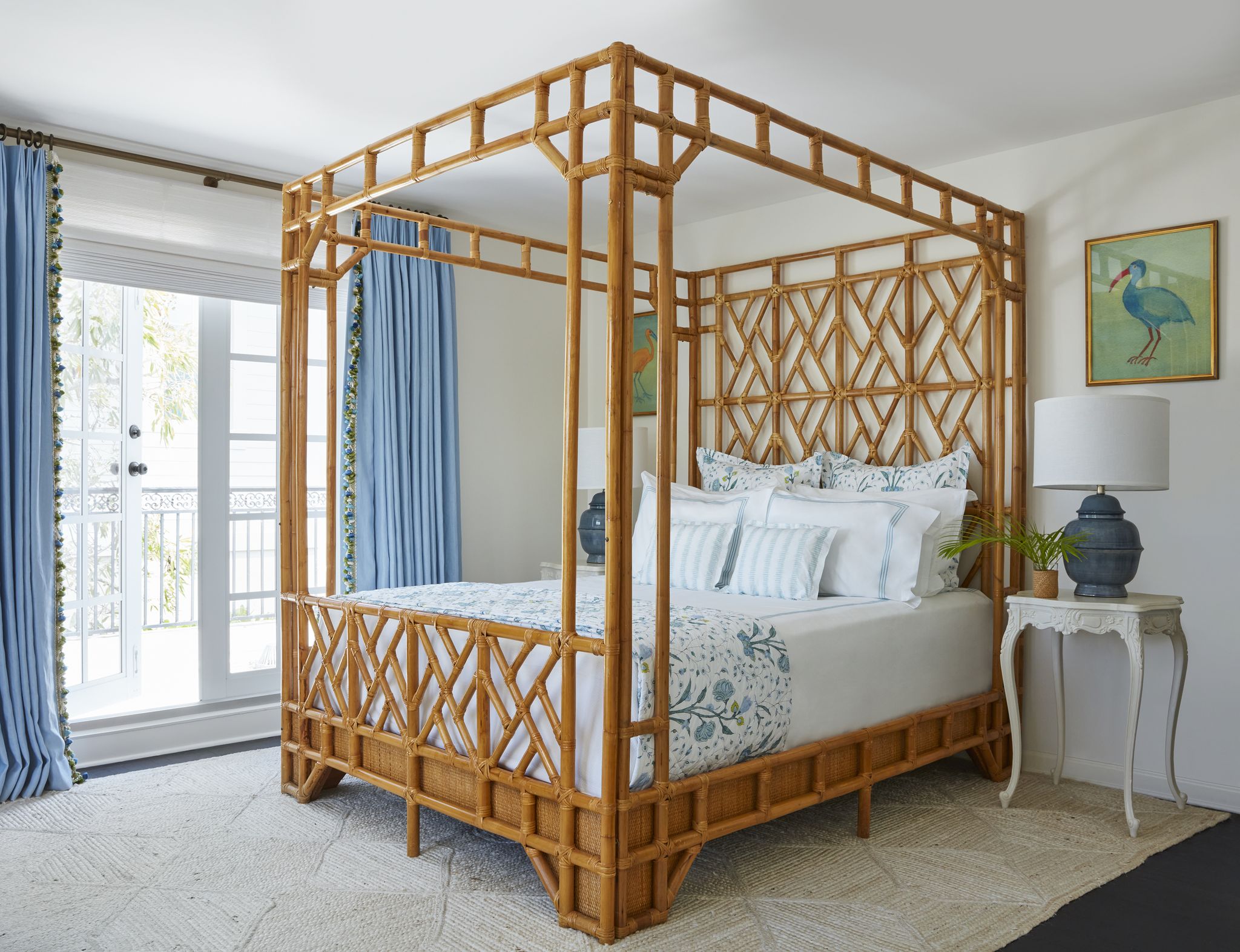 bedroom, bamboo bed frame, blue curtains