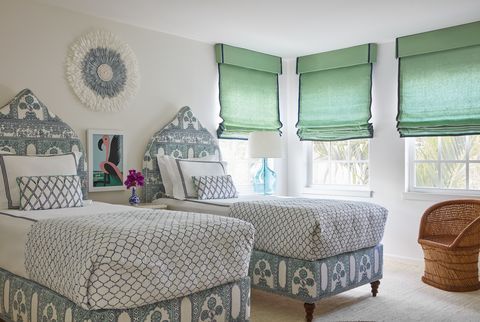 twin beds, green shades, flamingo print