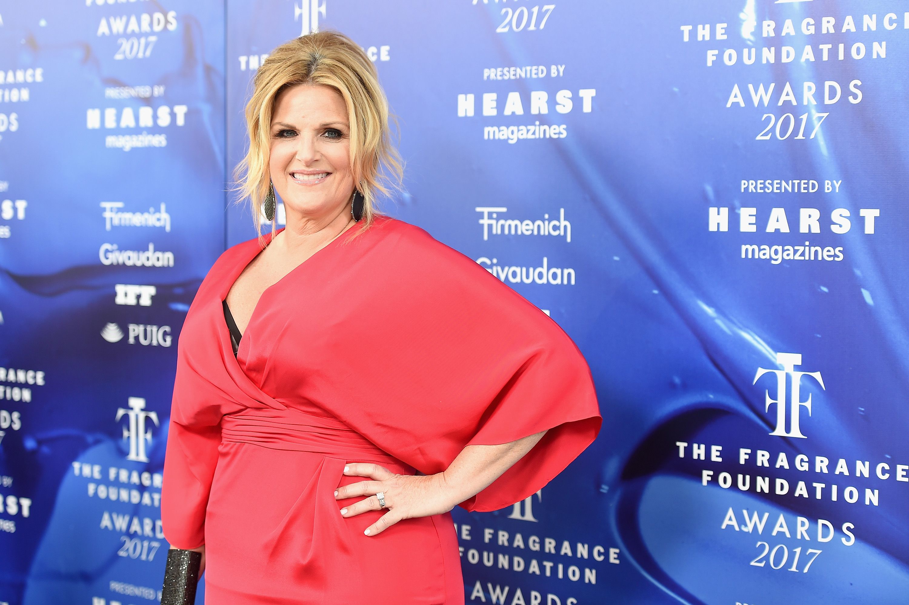 Trisha Yearwood looks incredible as she showcases slimmed down physique in  silver sequin dress