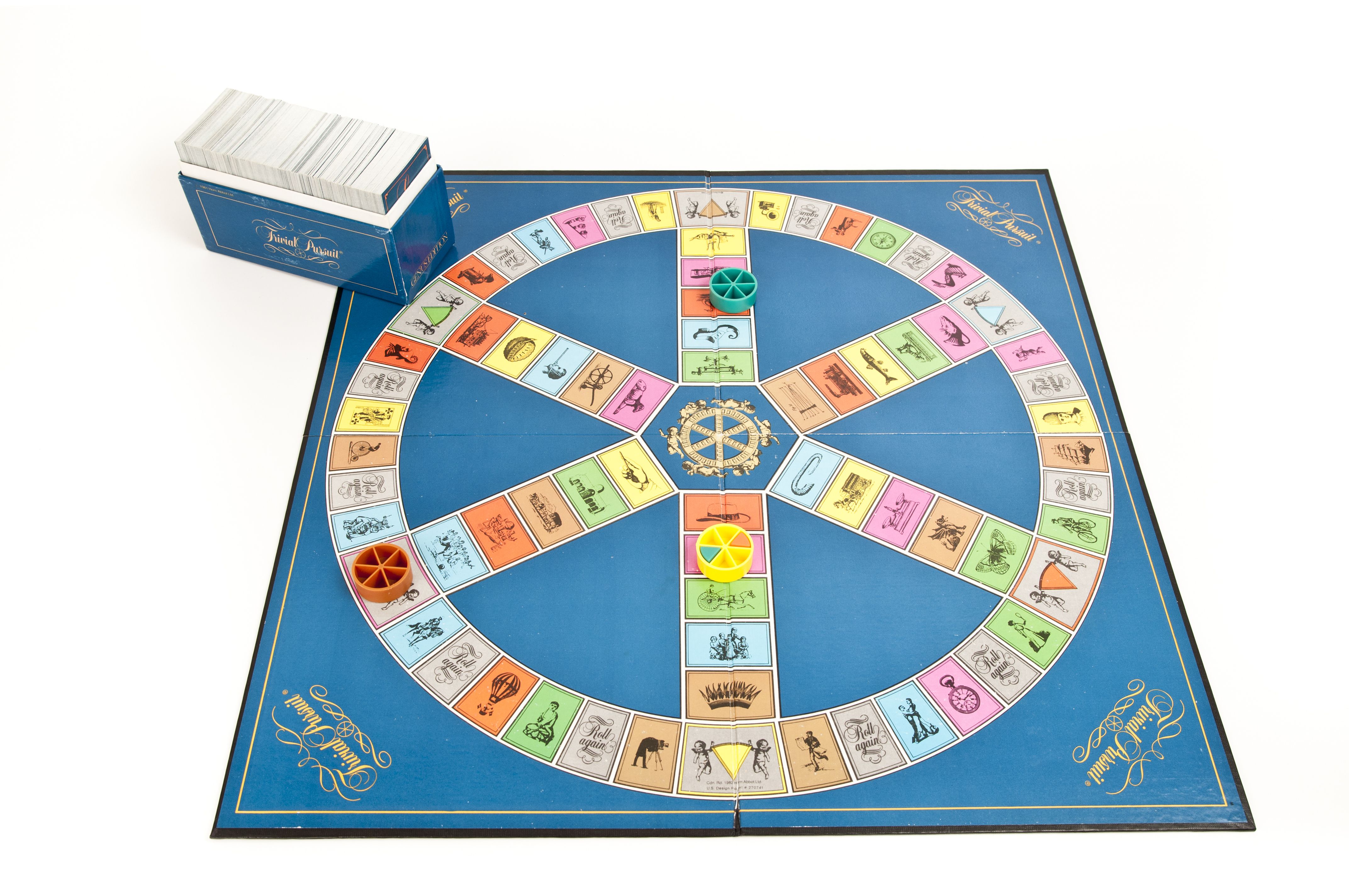 https://hips.hearstapps.com/hmg-prod/images/trivial-pursuit-game-board-with-card-box-and-player-royalty-free-image-1701083023.jpg