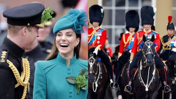 a woman in a blue dress standing next to a man in a green robe and a hat with