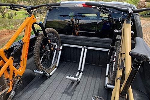bikes mounted in the bed of a truck