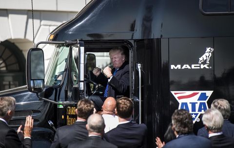 washington, dc   president donald trump jumps up in the cab of an 18 wheeler truck while meeting with truckers and ceos regarding healthcare on the south lawn of the white house in washington, dc thursday march 23, 2017 photo by melina marathe washington post via getty images