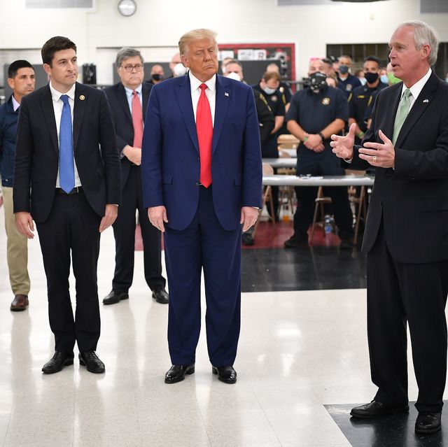 us president donald trump listens to republican senator ron johnson during a tour of an emergency operations center at mary d bradford high school in in kenosha, wisconsin on september 1, 2020   trump visited kenosha, the city at the center of a raging us debate over racism, despite pleas to stay away and claims he is dangerously fanning tensions as a reelection ploy photo by mandel ngan  afp photo by mandel nganafp via getty images