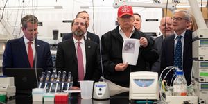 us president donald trump c holds a picture of the coronavirus with us health and human service secretary alex azar 2nd l, cdc director robert redfield 2nd r, and cdc associate director for laboratory science and safety adlss dr steve monroe r during a tour of the centers for disease control and prevention cdc in atlanta, georgia, on march 6, 2020 photo by jim watson  afp photo by jim watsonafp via getty images