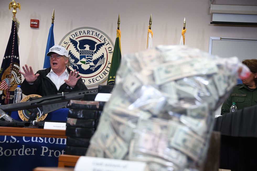 topshot   us president donald trump speaks during his visit to us border patrol mcallen station in mcallen, texas, on january 10, 2019   trump travels to the us mexico border as part of his all out offensive to build a wall, a day after he stormed out of negotiations when democratic opponents refused to agree to fund the project in exchange for an end to a painful government shutdown photo by jim watson  afp        photo credit should read jim watsonafp via getty images