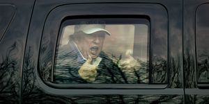sterling, virginia   november 22 us president donald trump gives thumbs up to supporters from this motorcade after he golfed at trump national golf club on november 22, 2020 in sterling, virginia the previous day president donald trump left the g20 summit virtual event “pandemic preparedness” to visit one of his golf clubs as the virus has now killed more than 250,000 americans photo by tasos katopodisgetty images