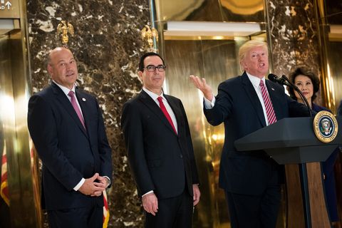 new york, ny   august 15 president donald trump delivers remarks following a meeting on infrastructure at trump tower, august 15, 2017 in new york city standing alongside him from l to r, director of the national economic council gary cohn, treasury secretary steve mnuchin, and transportation secretary elaine chao he fielded questions from reporters about his comments on the events in charlottesville, virginia and white supremacists photo by drew angerergetty images