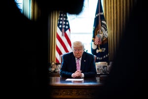 washington, dc   april 10 president donald trump bows his head during a easter blessing by bishop harry jackson, senior pastor at hope christian church in beltsville, md, in the oval office of the white house on  april 10, 2020 in washington, dcthe trump adminstration is stressing the need for physical distancing over the easter weekend photo by al drago   poolgetty images